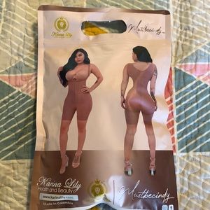 Karina Lily Mustbecindy Faja, Size Large New never worn.. color: Brown